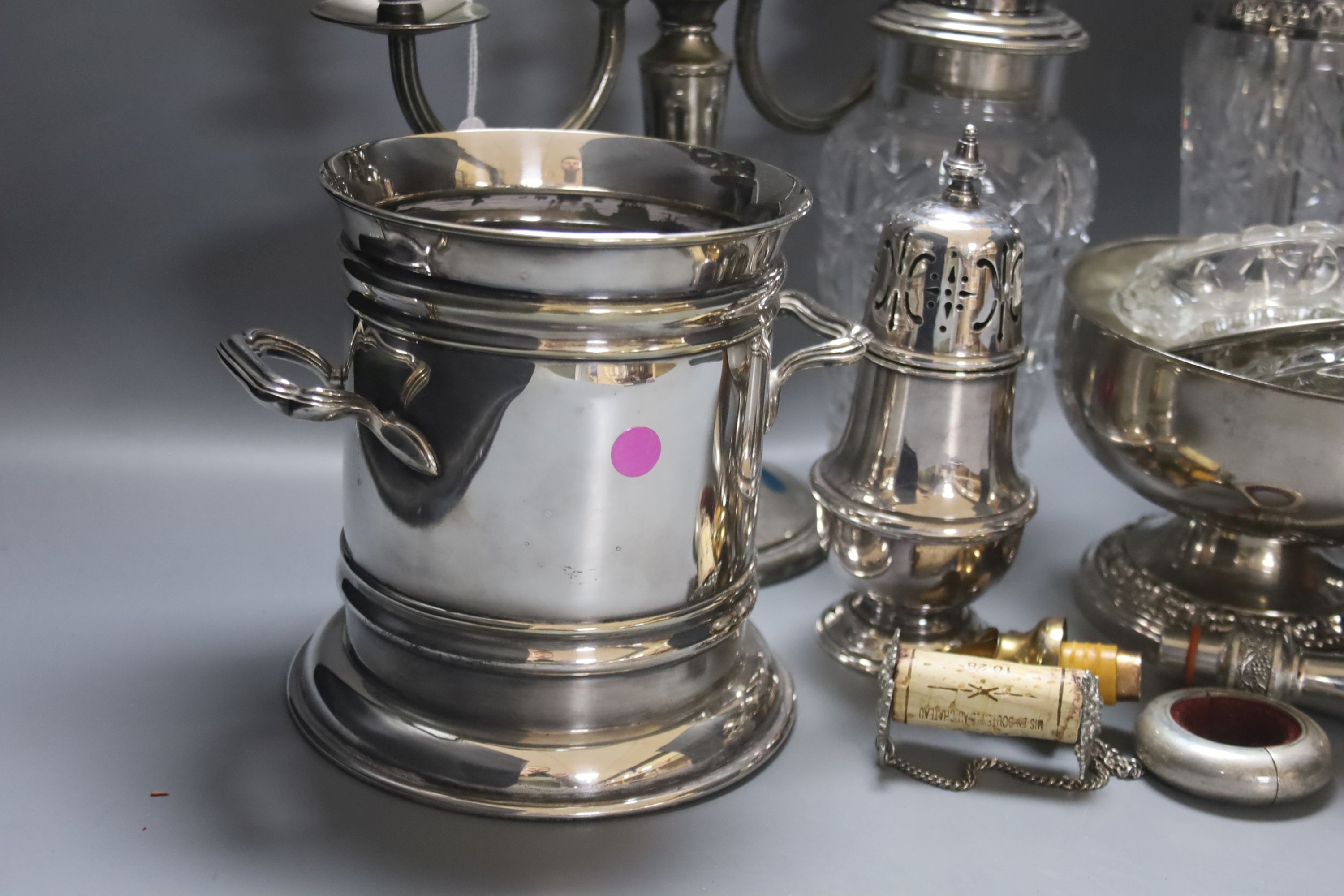 Assorted plated wares including a mounted glass biscuit barrel.